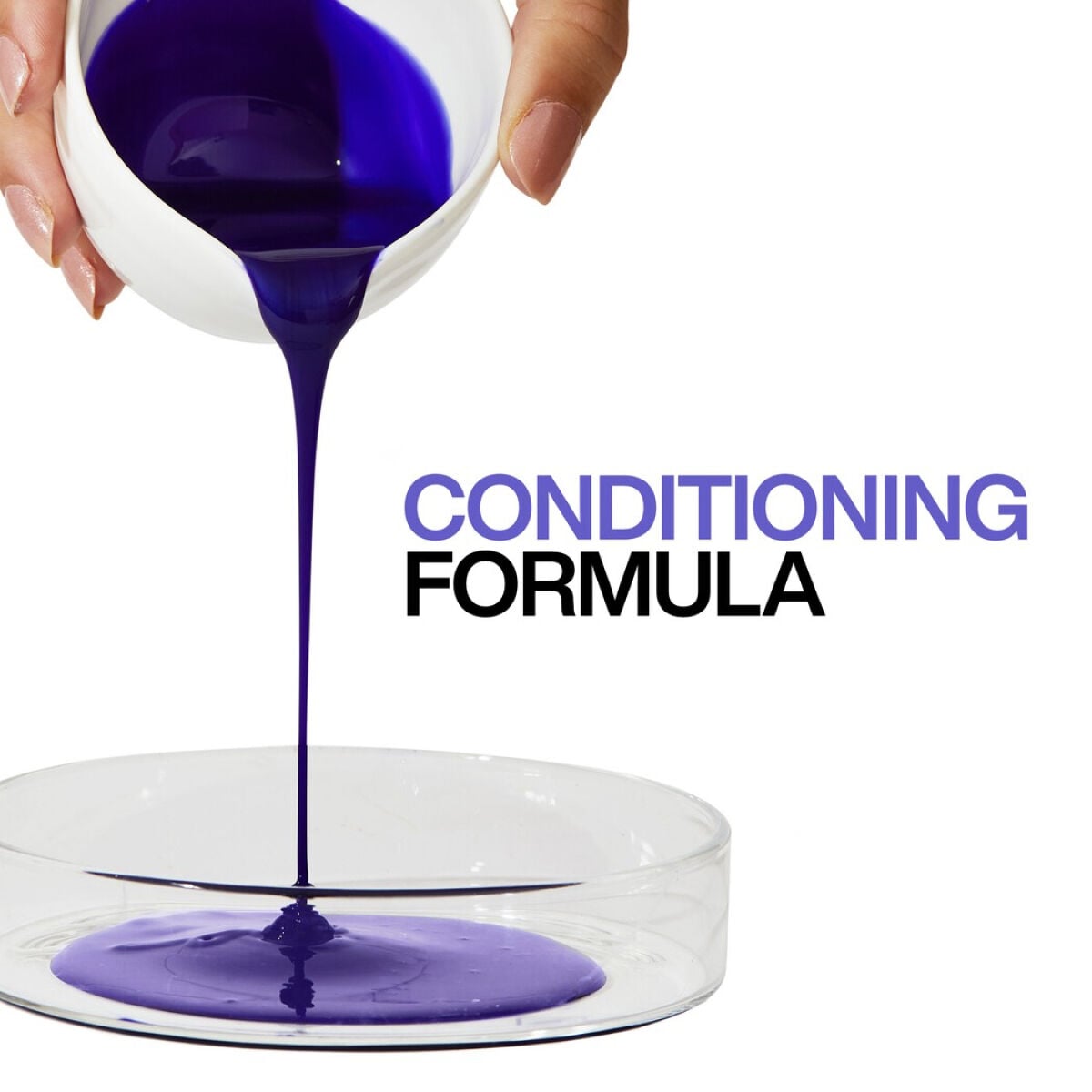 Deep blue conditioning formula pouring from white bottle into petri dish, labeled "CONDITIONING FORMULA